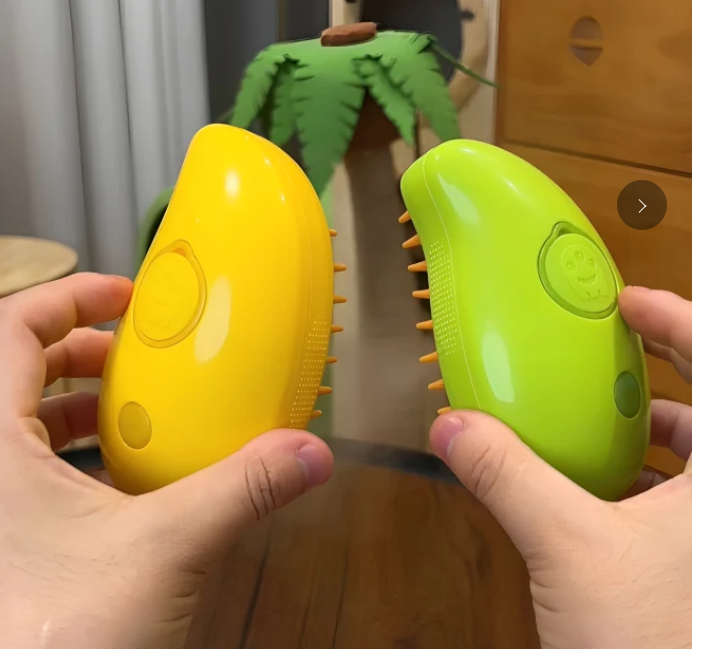 hands holding both variants of the steamy brush (yellow and green)