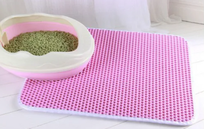 pink cat litter mat/pad and a litter box